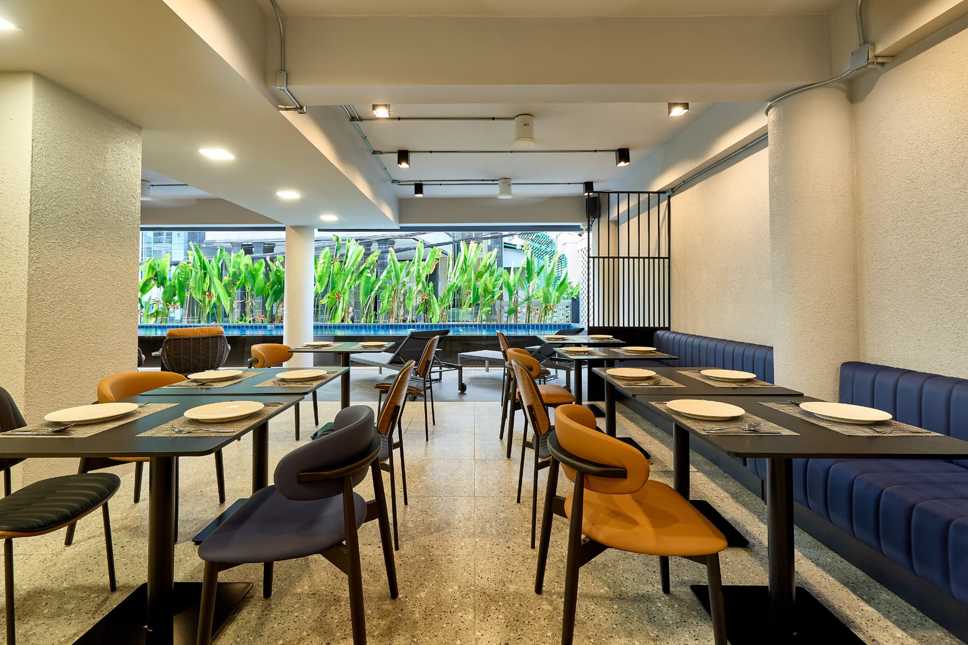 Glow Restaurant and Bar dining room beside the pool greenery